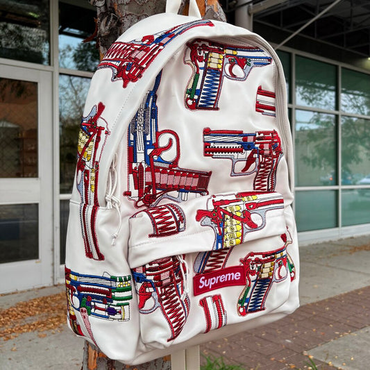 SUPREME GUNS EMBROIDERED BOOKBAG